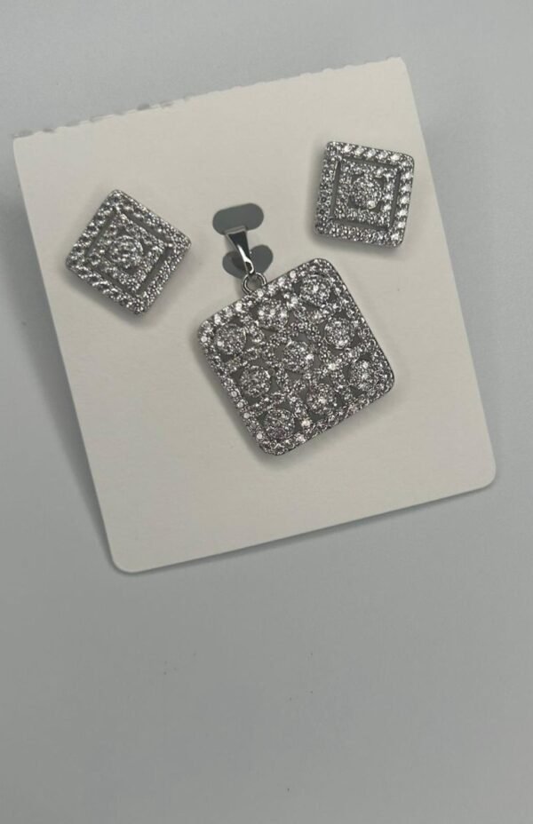 Silver earrings and pendant