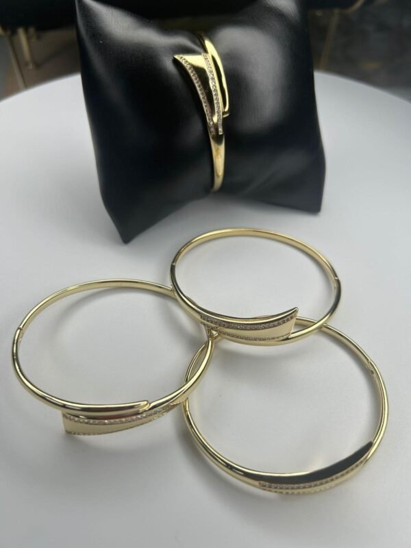 Gold replica bangle